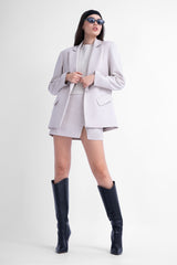 Ivoiry suit with regular blazer and mini skirt