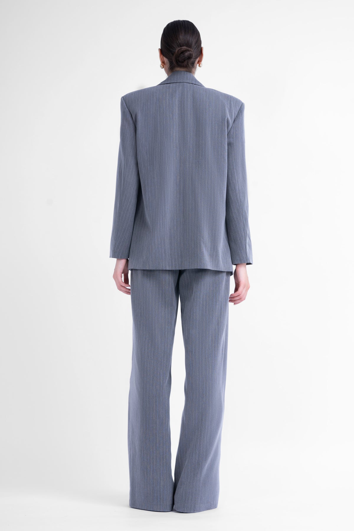 Three-piece grey striped suit
