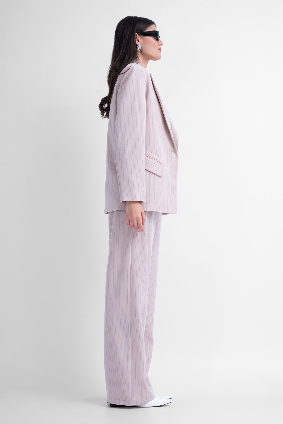 Three-piece beige striped suit