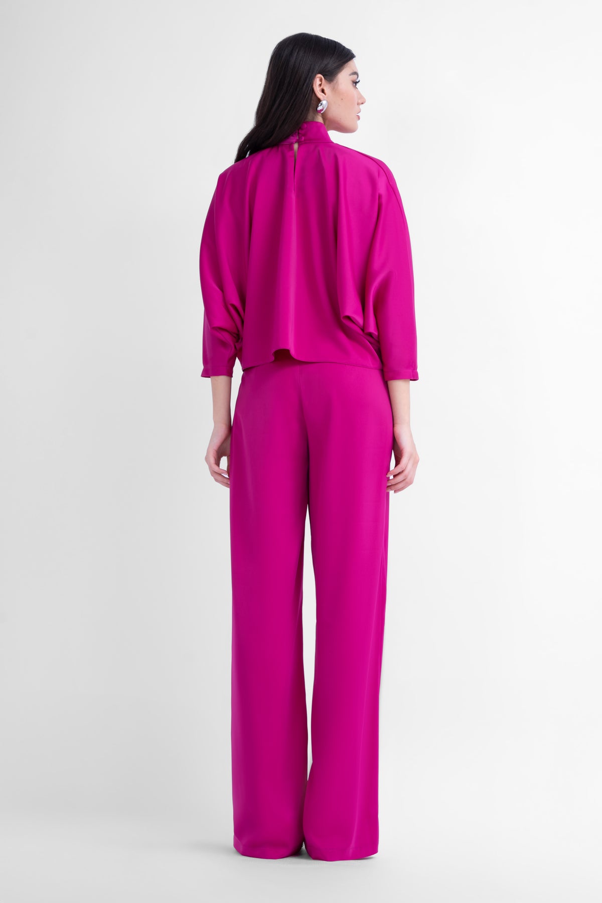 Fuchsia asymmetrical wide leg trousers with button