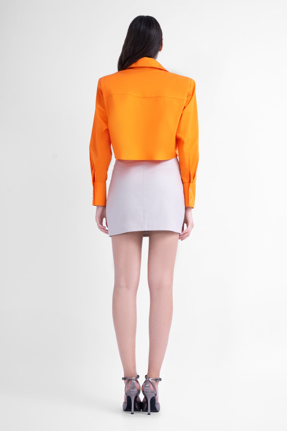 Bright orange cropped poplin shirt with oversized shoulders