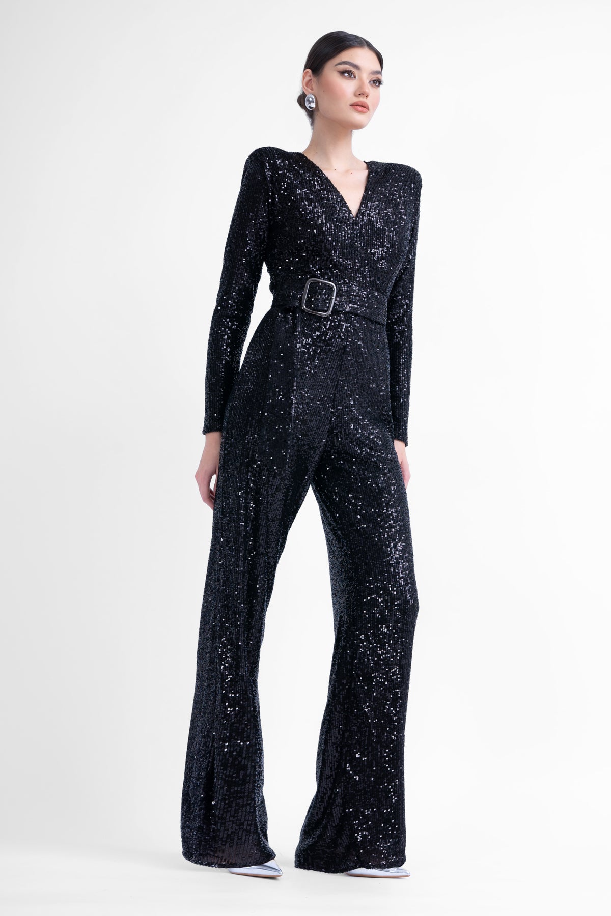 Black maxi jumpsuit with structured shoulders and belt