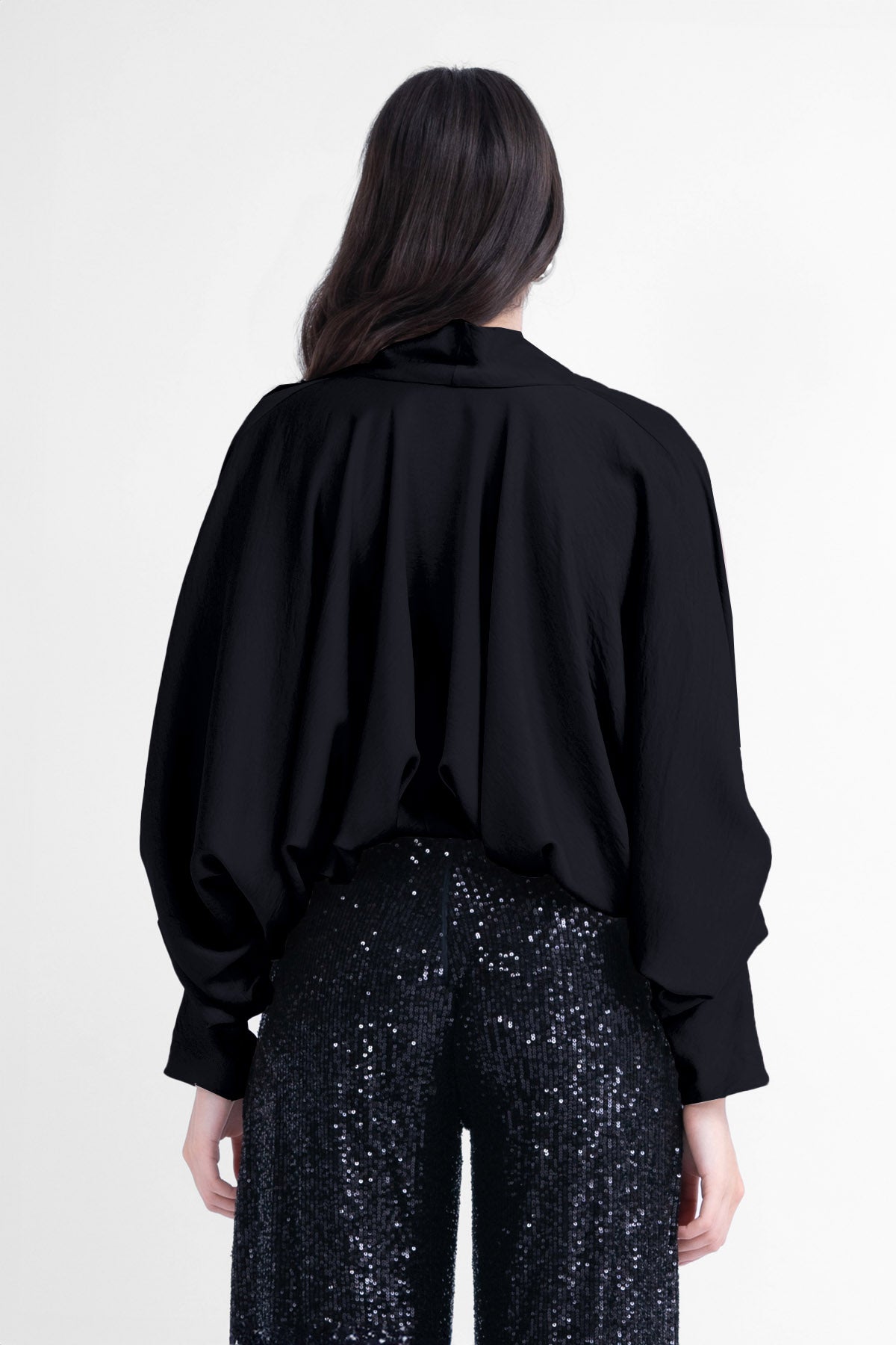 Black blouse with draped sleeves and v-neck
