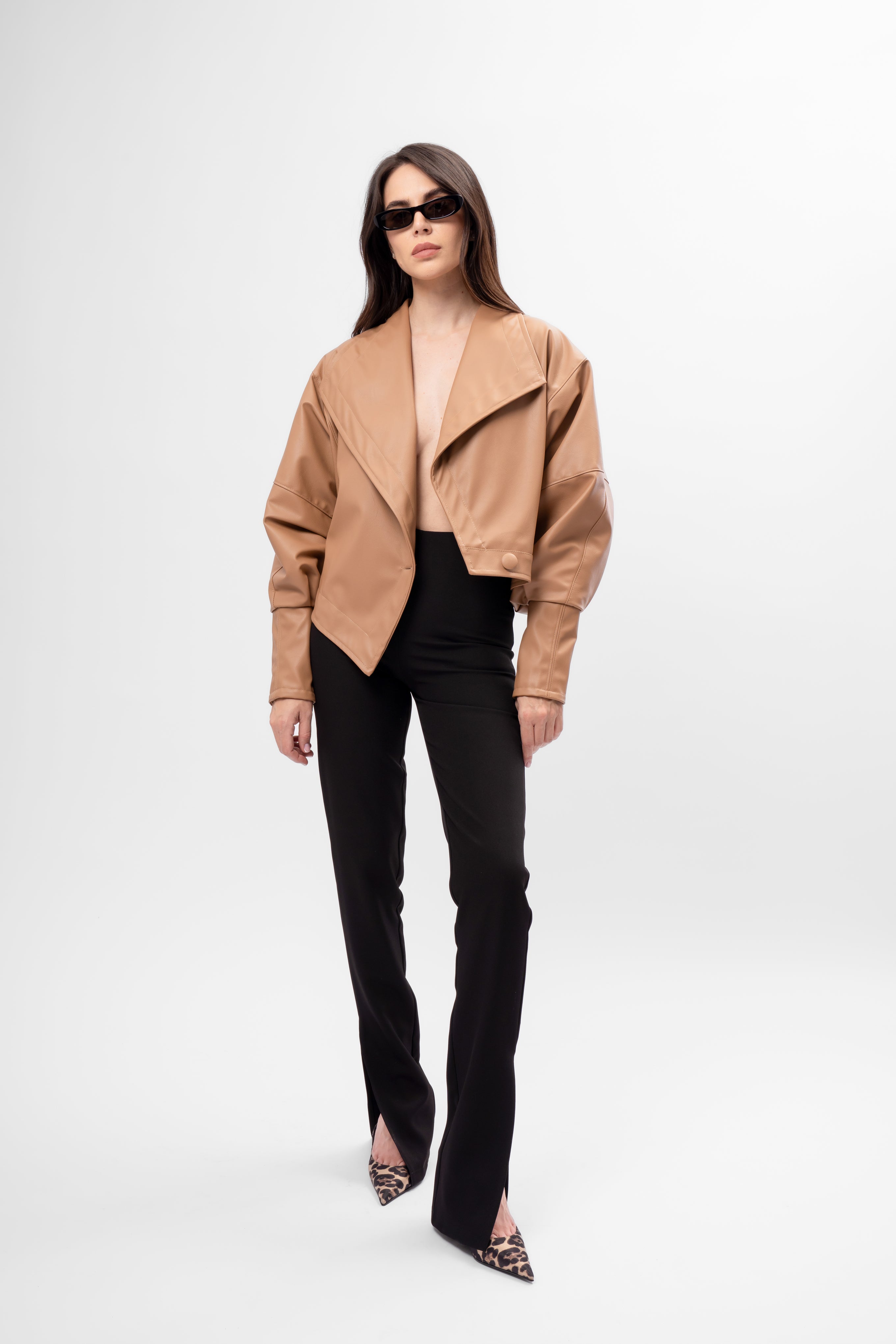 Asymmetric camel cropped faux leather jacket with oversized fit