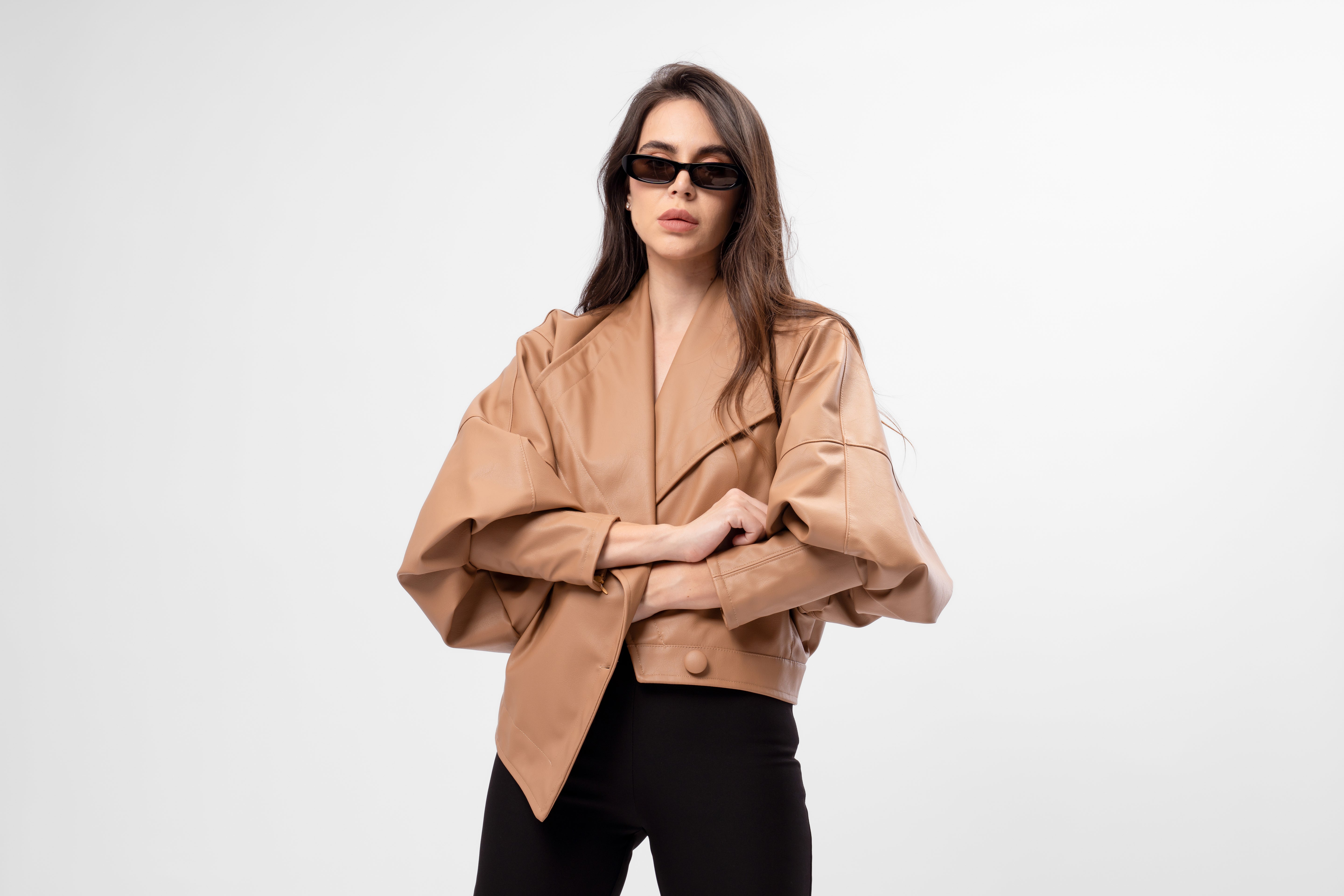 Asymmetric camel cropped faux leather jacket with oversized fit