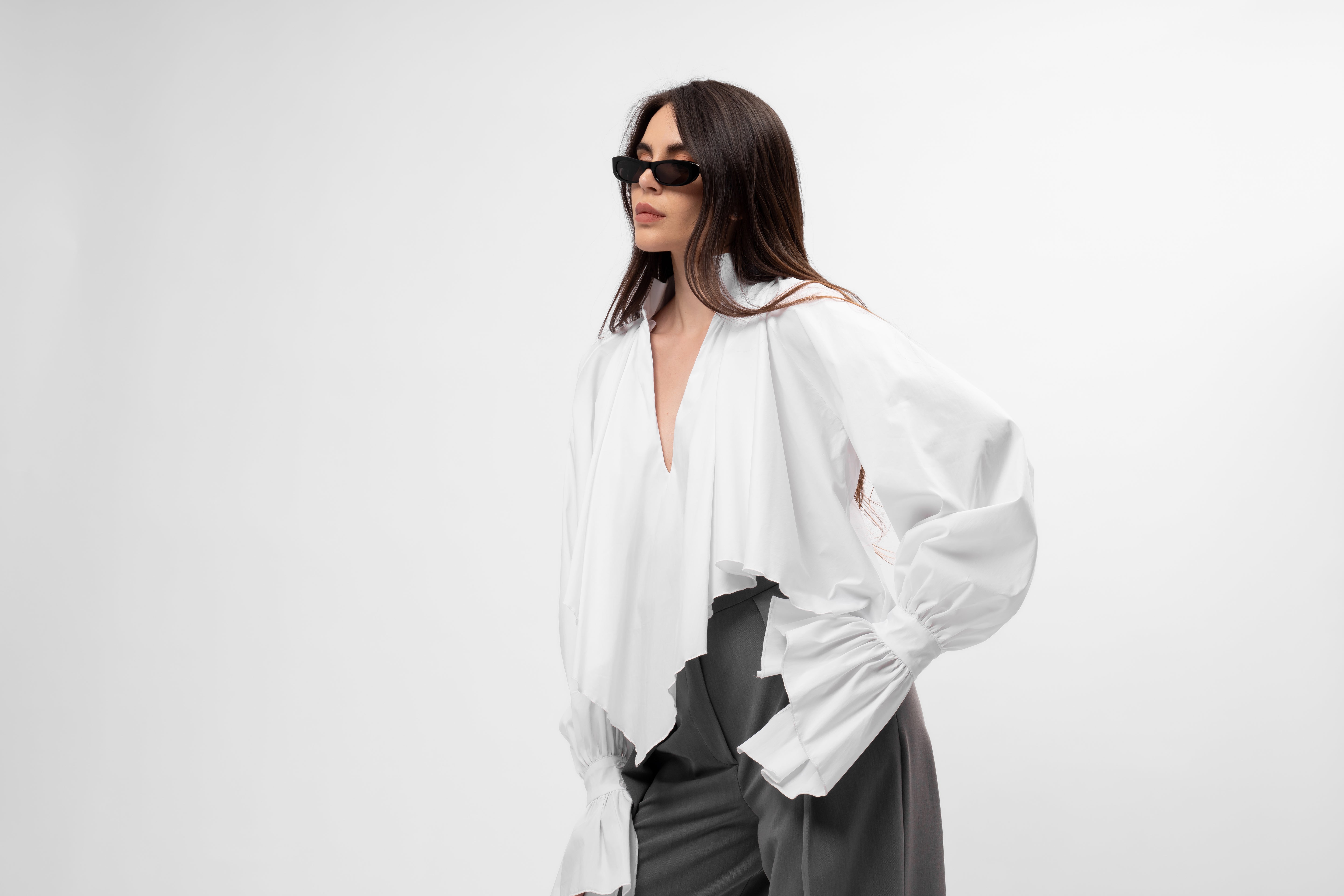 White oversized shirt with high collar and balloon sleeves
