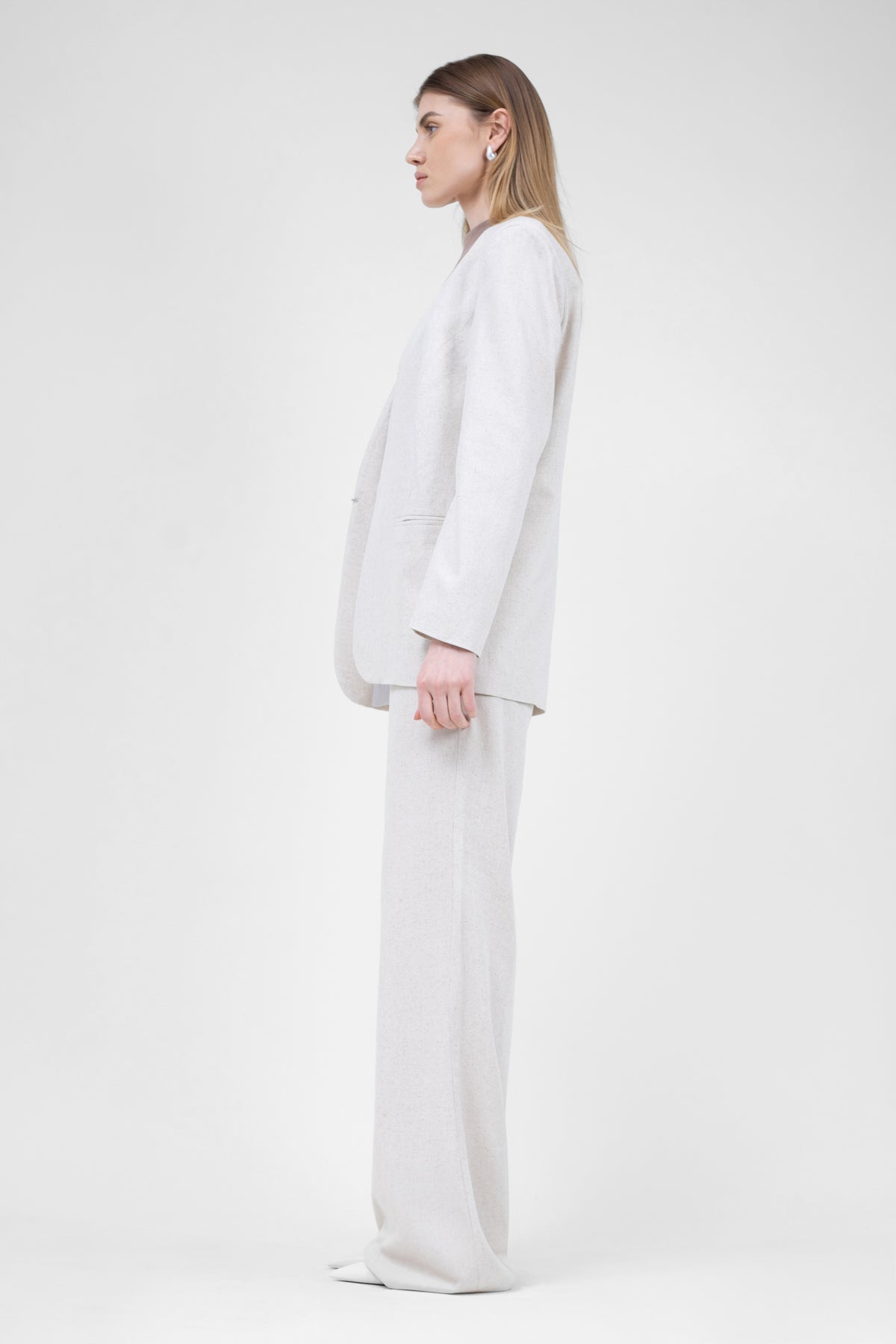 Ivory linen suit with blazer and straight trousers