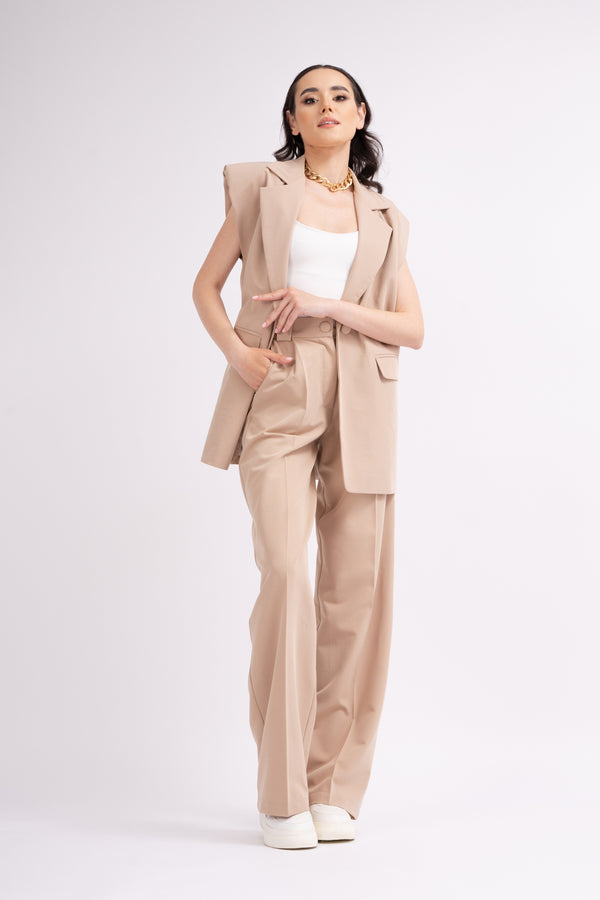 Beige suit with oversized vest and wide leg trousers