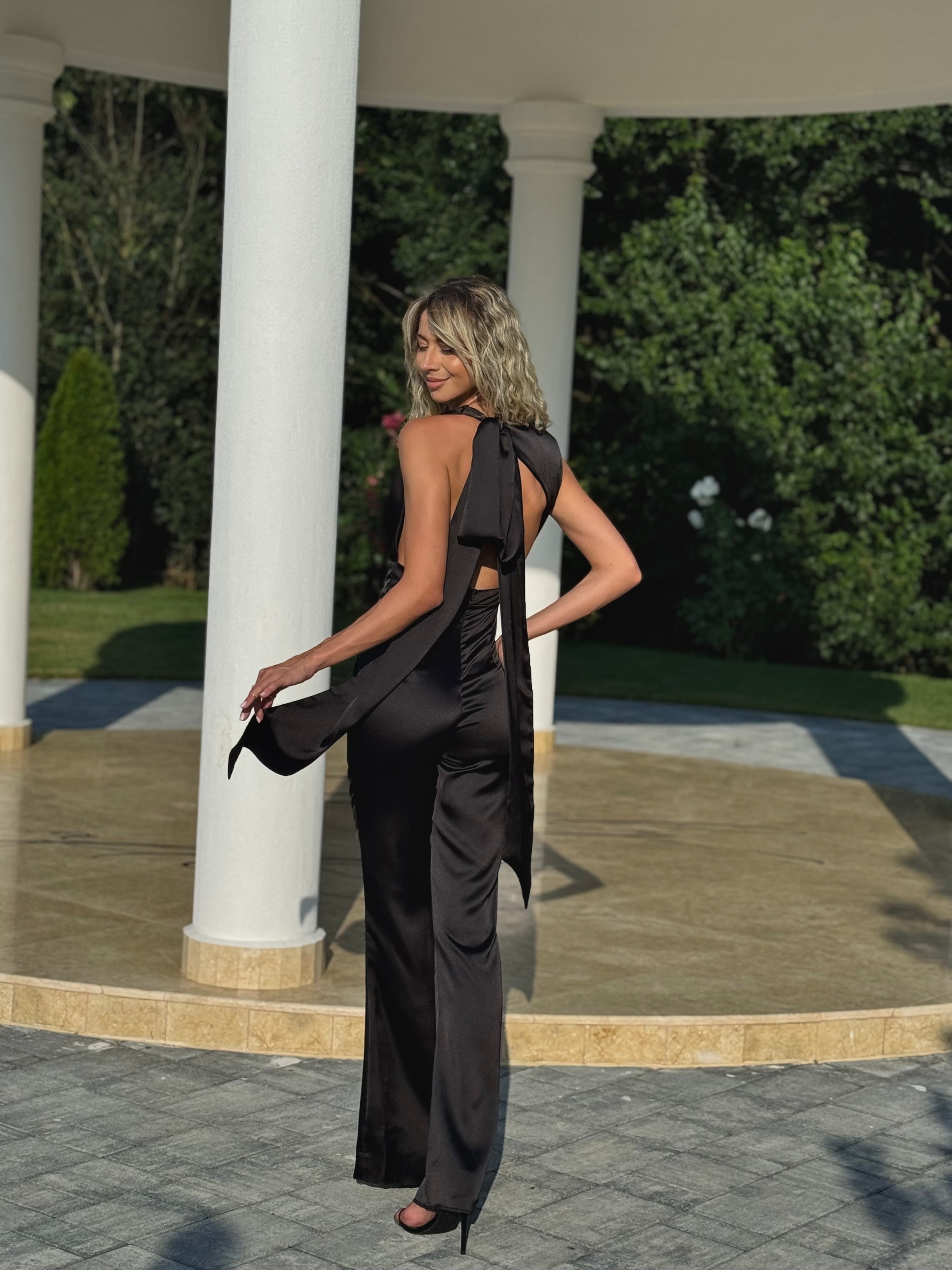 Elegant Purple Draped Jumpsuit with Flared Legs