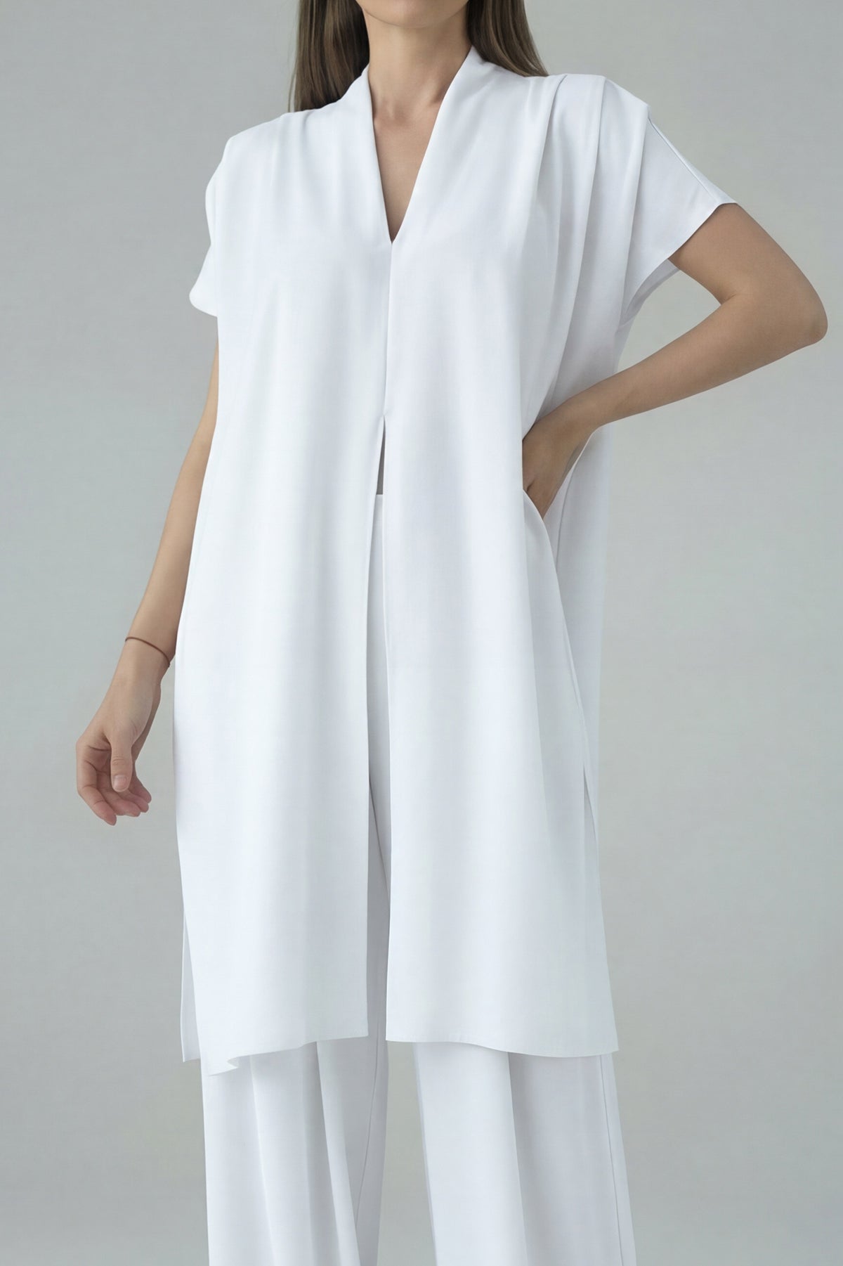 Set fluid alb cu top petrecut și pantaloni wide leg