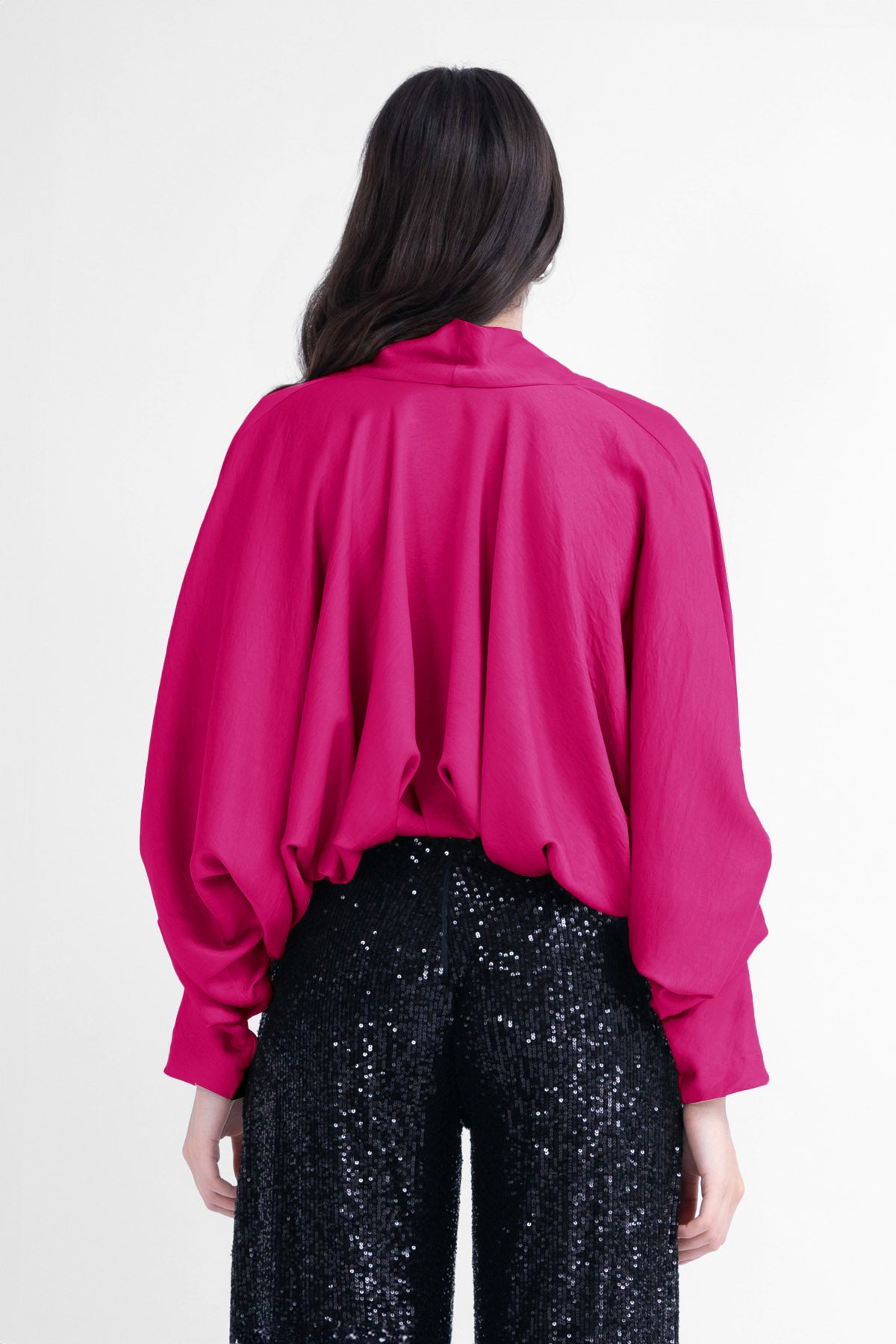Fuchsia blouse with draped sleeves and v-neck