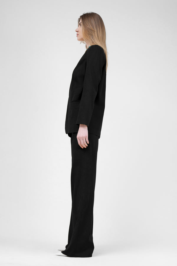 Black linen suit with blazer and straight trousers