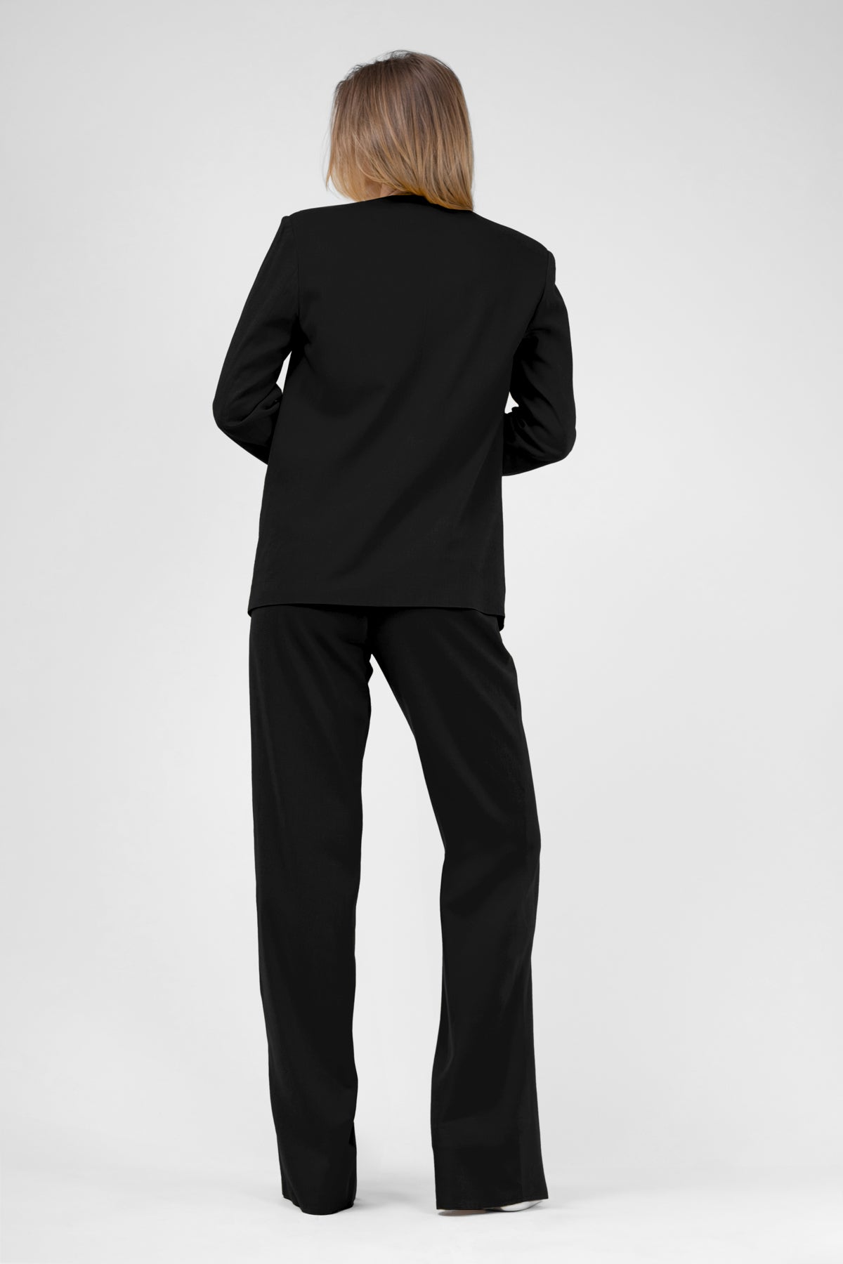 Black linen suit with blazer and straight trousers
