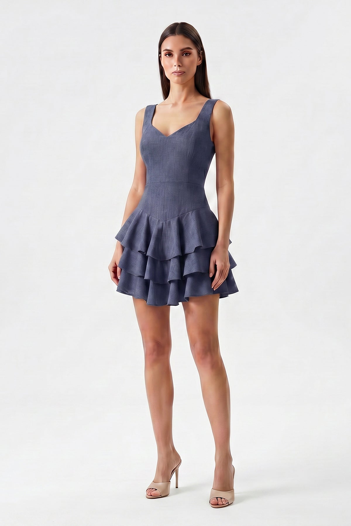 Navy linen mini dress with fitted silhouette and layered ruffle skirt