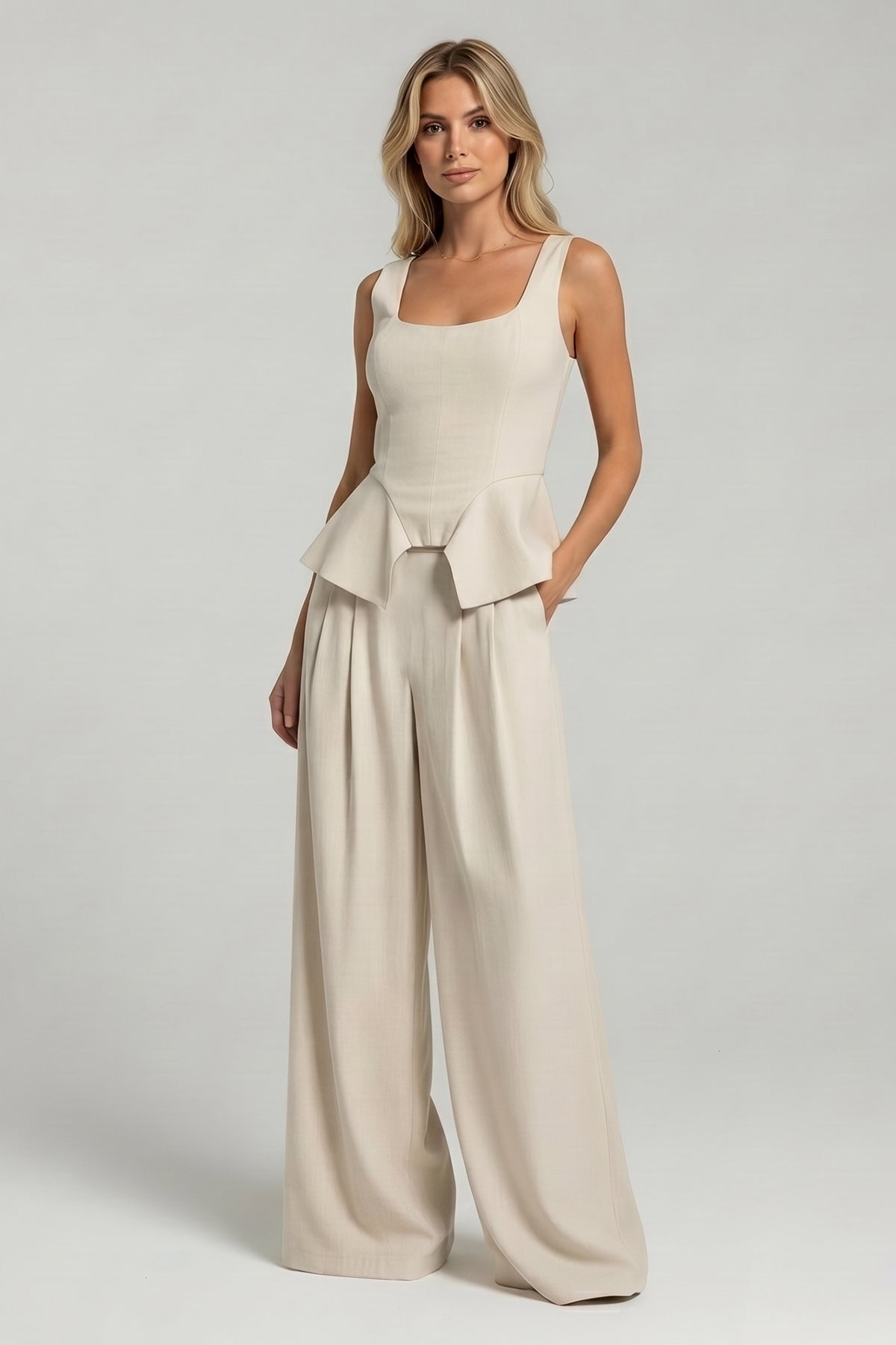 Ivory set with peplum-style corset and wide-leg trousers