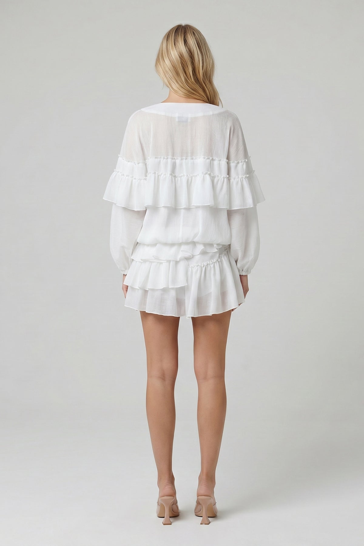 White crinkled fabric set with ruffles and skort