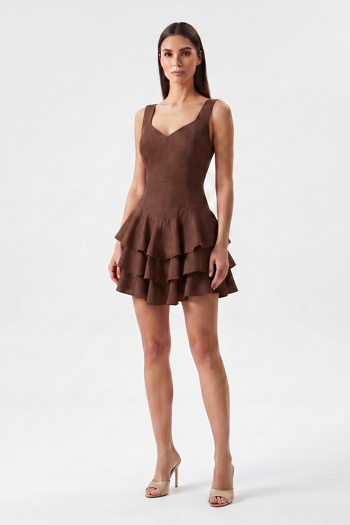 Brown linen mini dress with fitted silhouette and layered ruffle skirt
