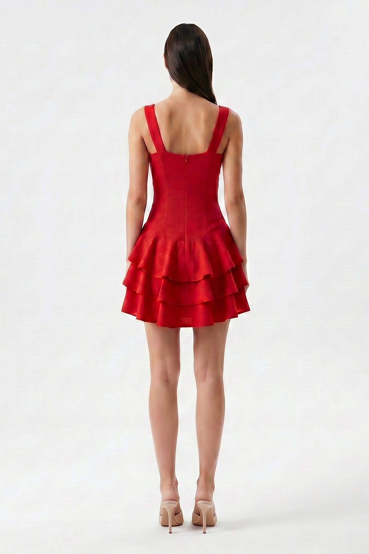 Red linen mini dress with fitted silhouette and layered ruffle skirt