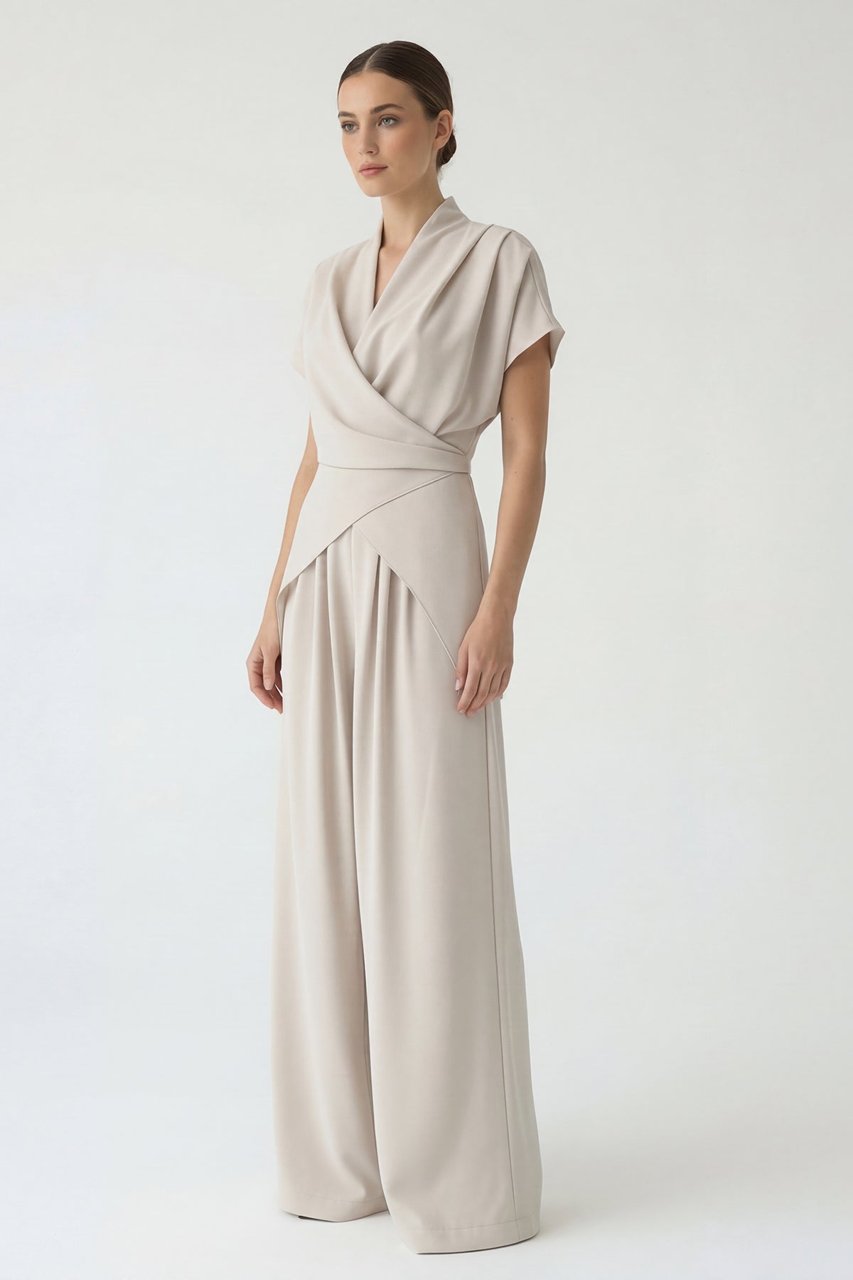 Beige fluid set with a wrap top and wide-leg trousers
