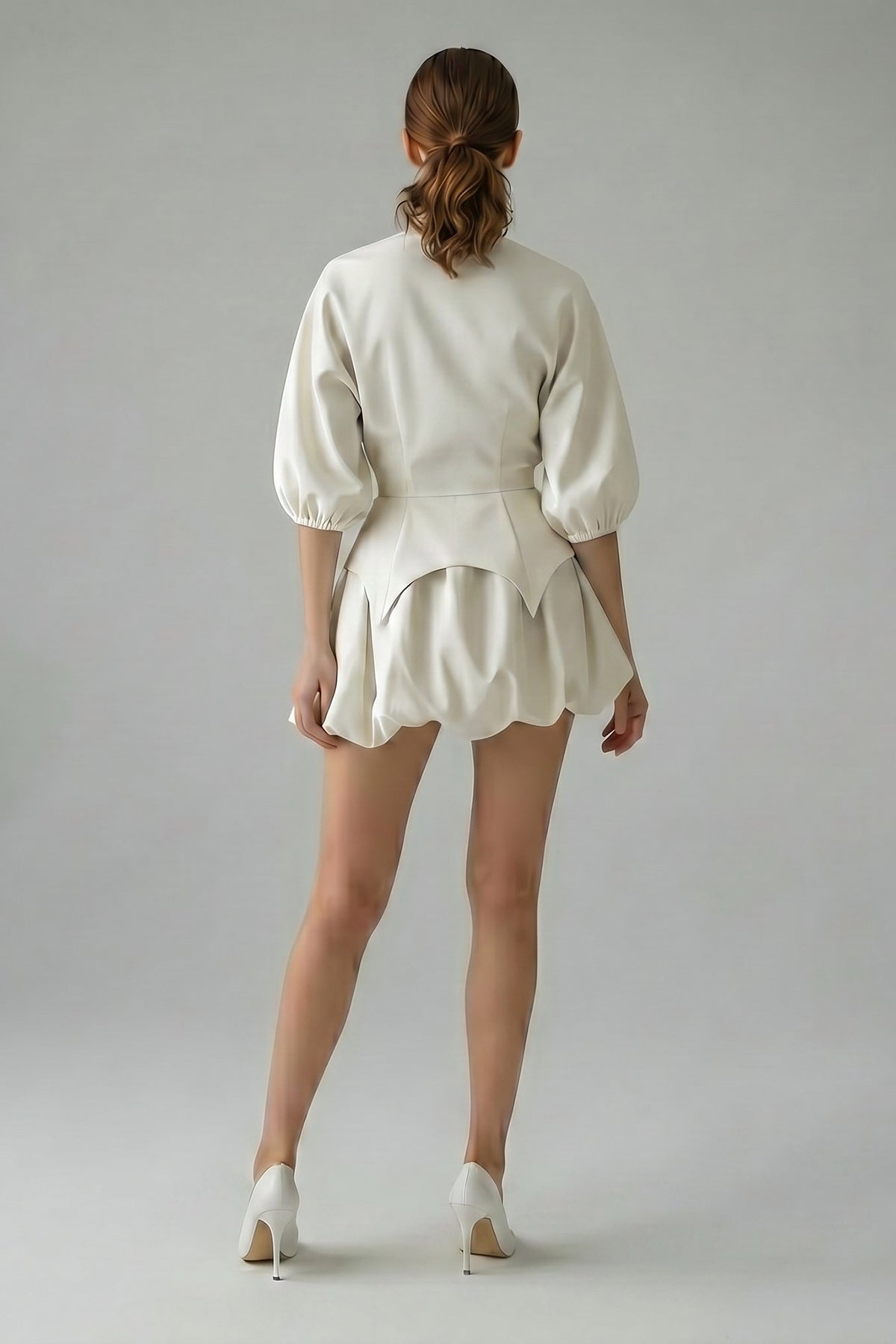 Off White set with structured top and balloon mini skirt