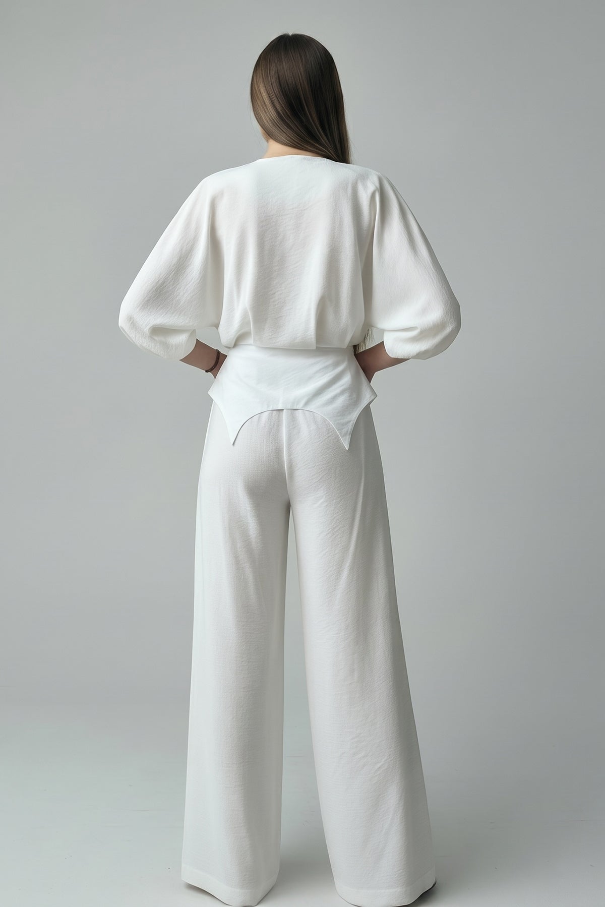 White set with structured top and wide-leg trousers