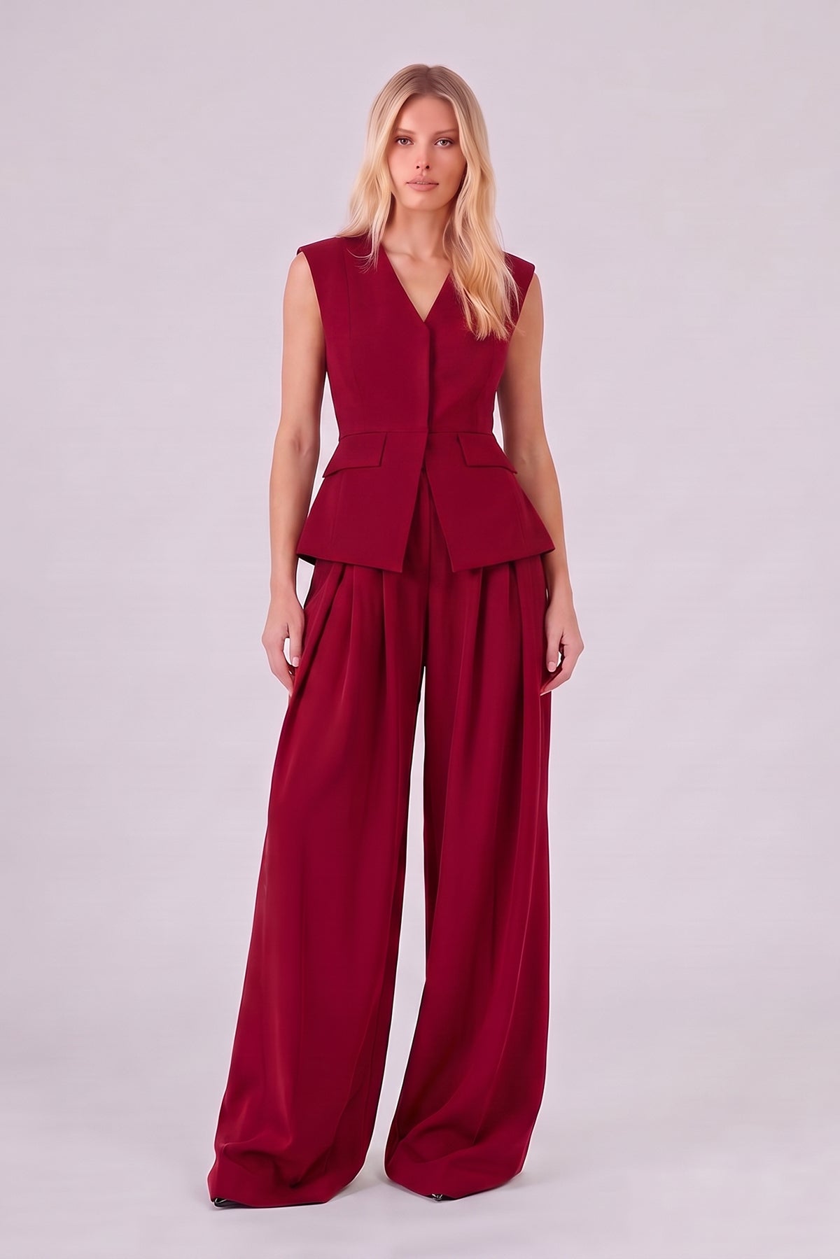 Red Set with Structured Peplum Vest and Pleated Wide-Leg Trousers