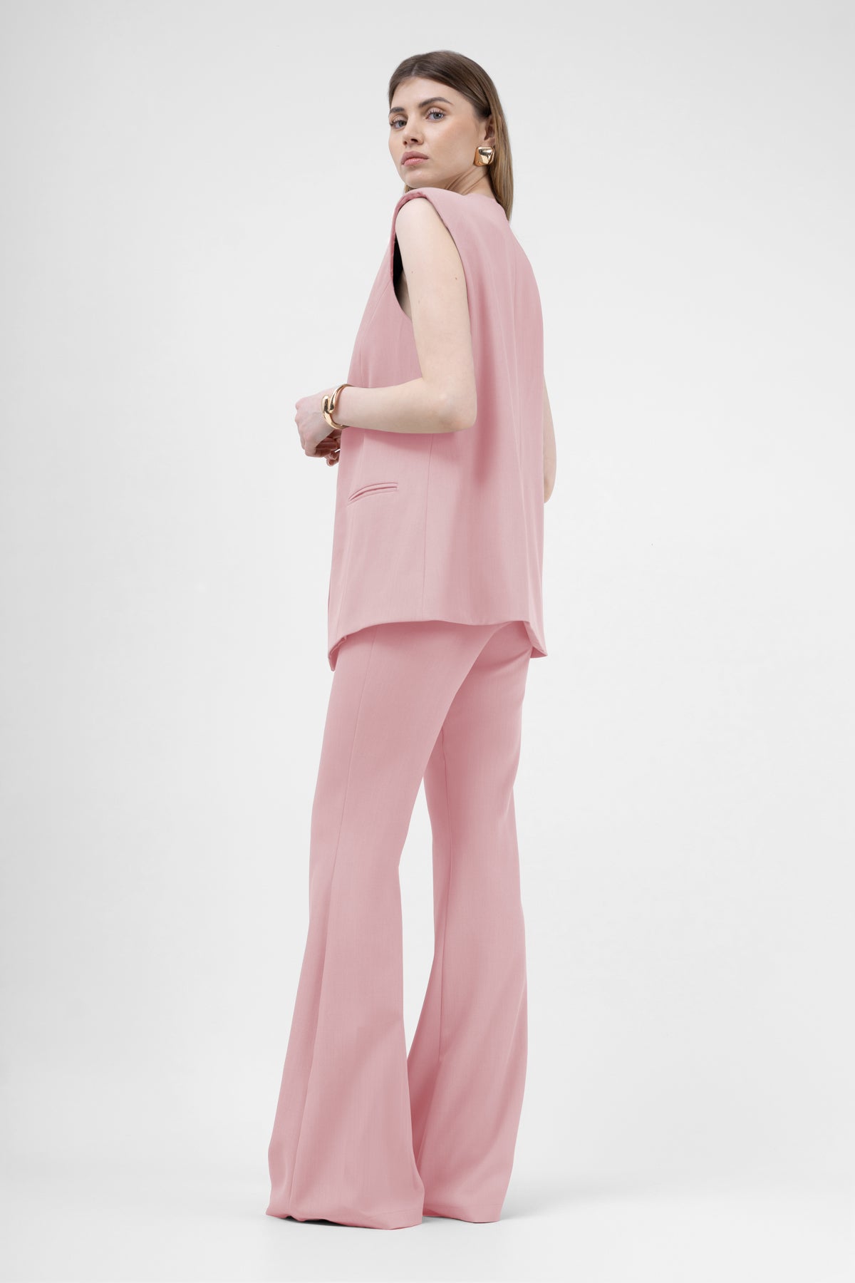Pastel Pink With Oversized Vest And Flared Trousers