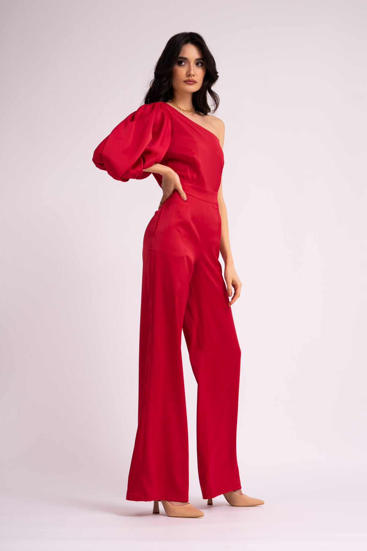 Red maxi jumpsuit with one flared sleeve