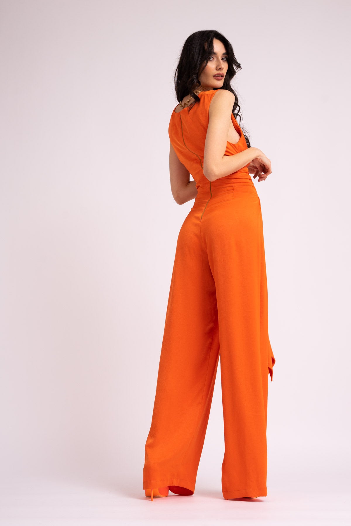 Neon orange jumpsuit with knot