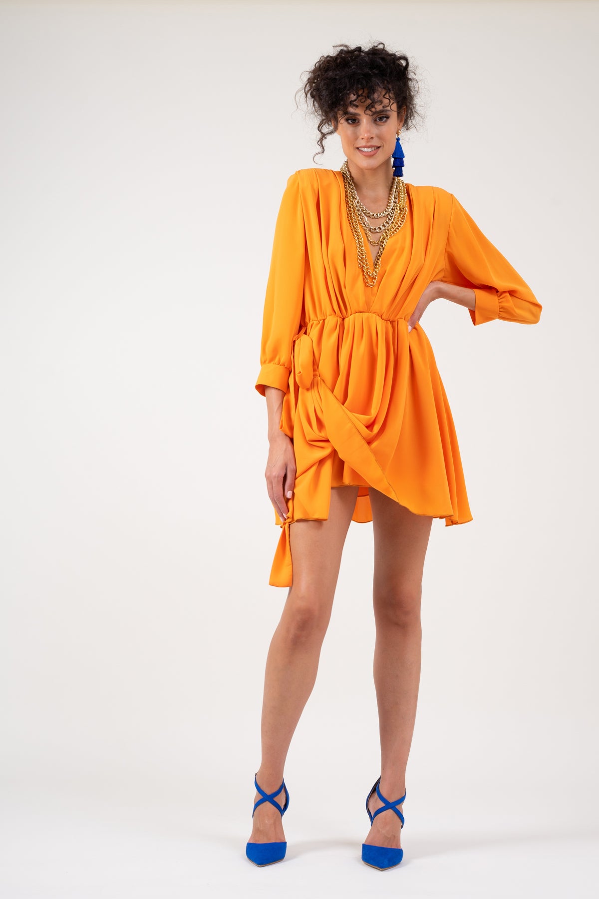 Orange dress with adjustable draping