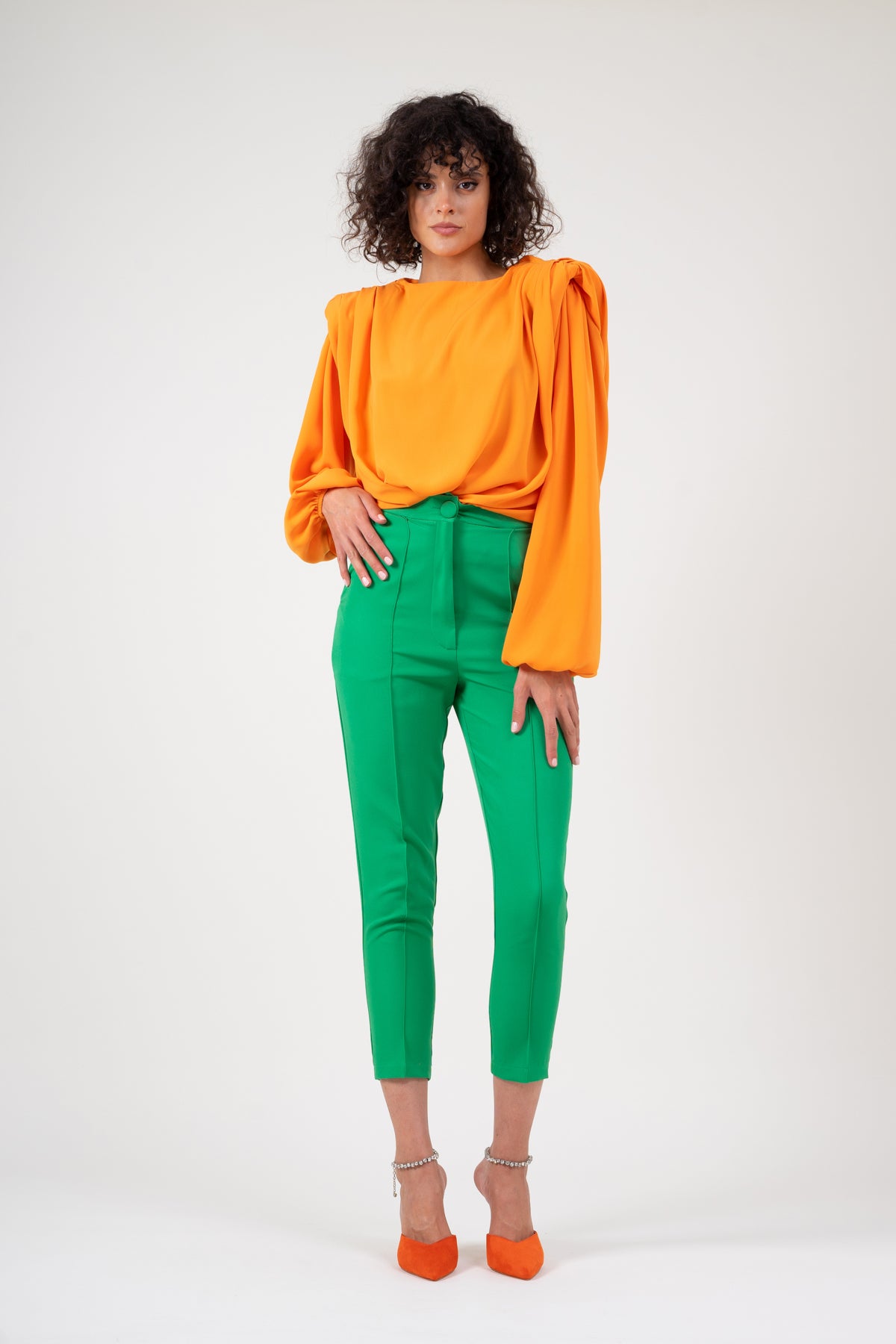 Orange blouse with padded shoulders