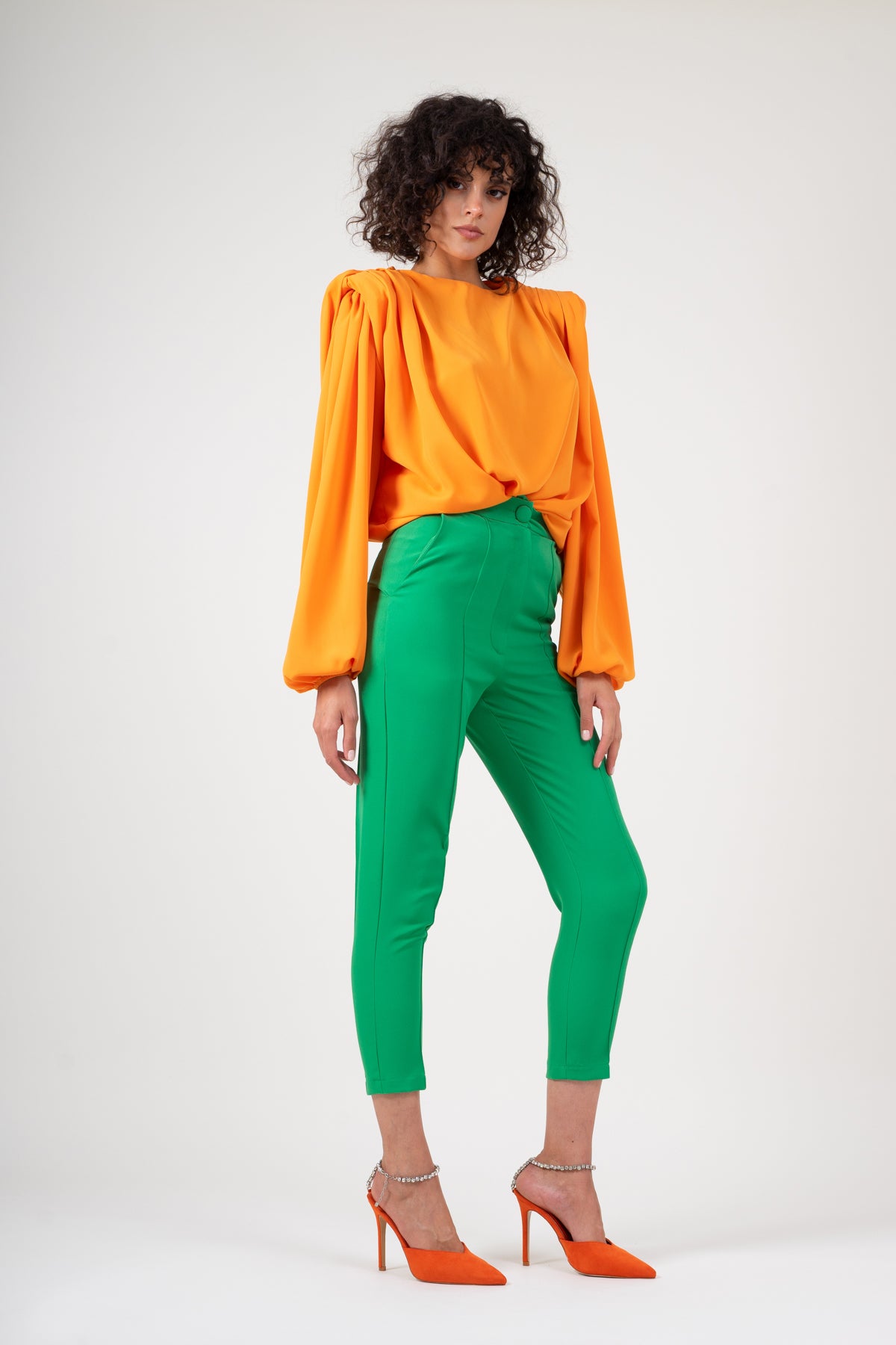 Orange blouse with padded shoulders