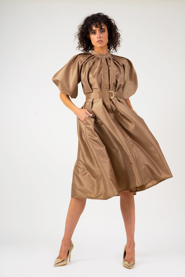 Bronze dress with raglan sleeve and pleats