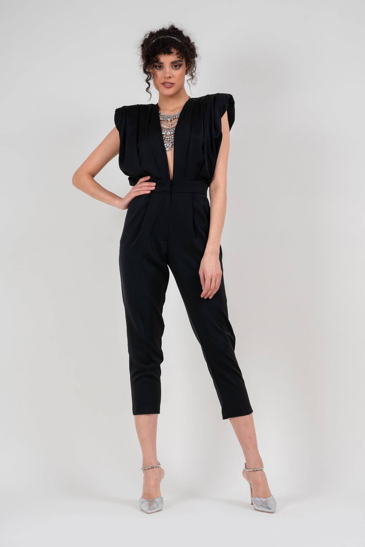 Black draped jumspuit with conical trousers