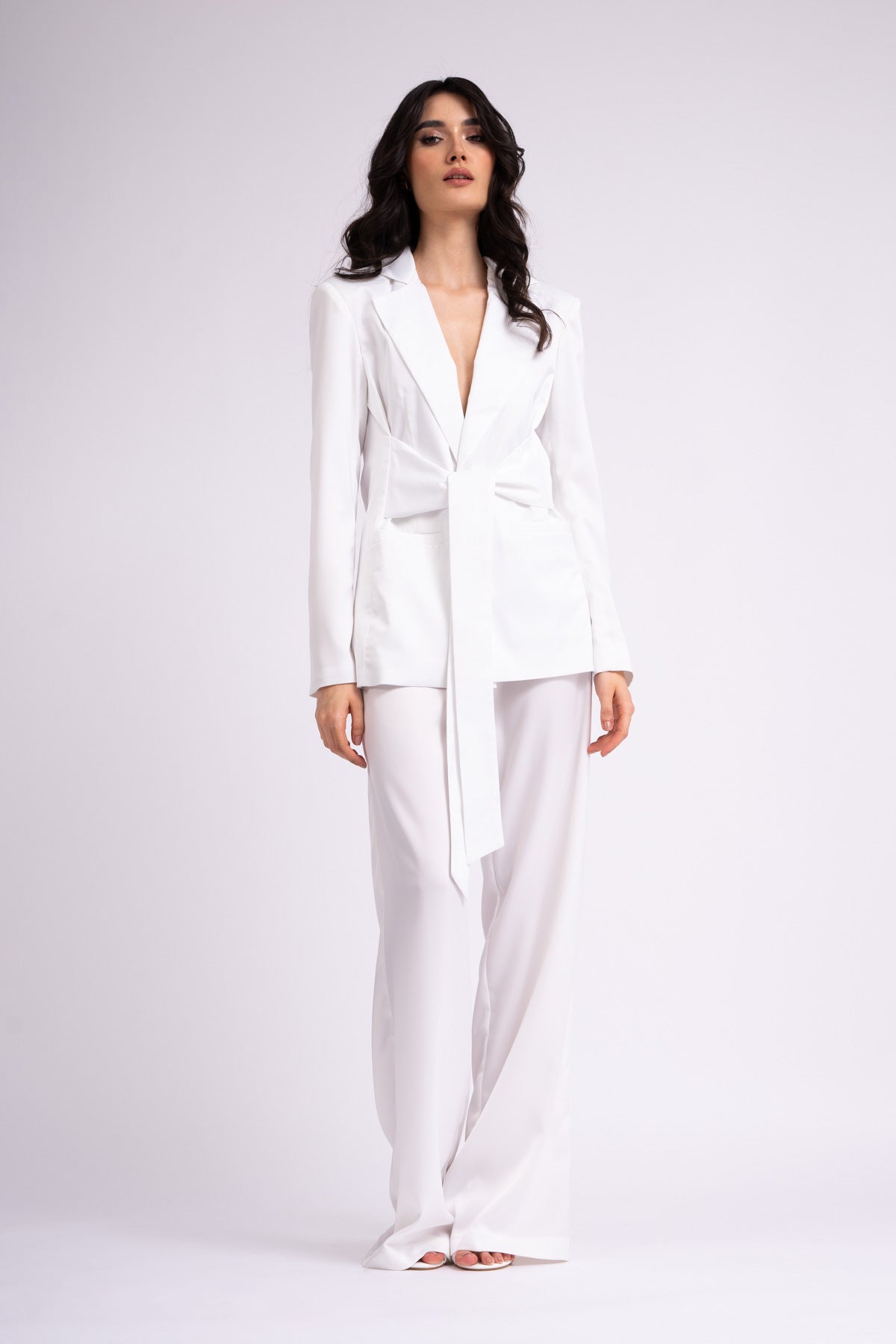 White suit with blazer with scarves and wide leg pants