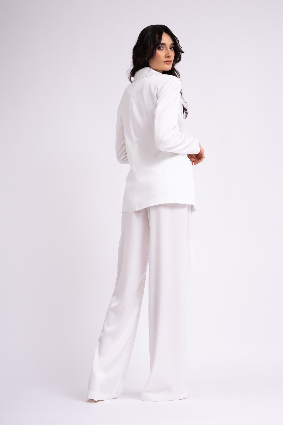 White suit with blazer with scarves and wide leg pants