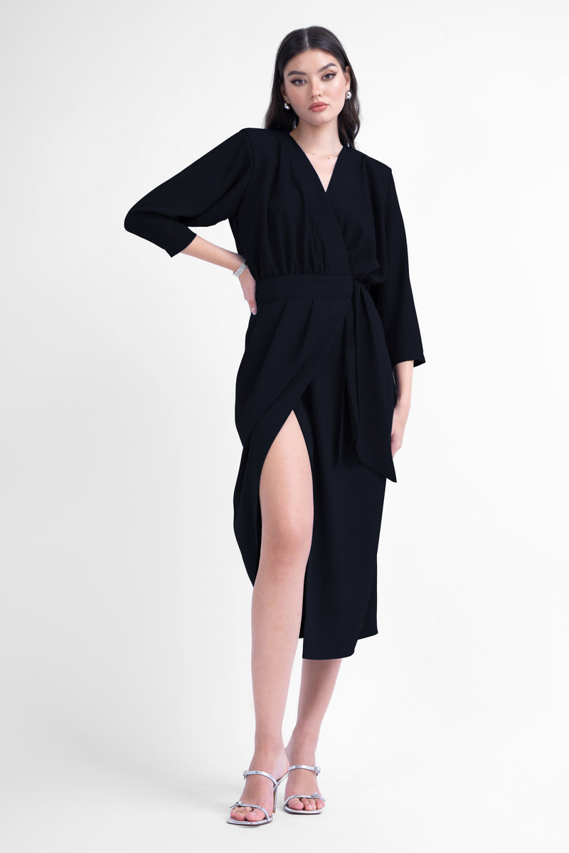 Black midi dress with draping detailing and waist belt