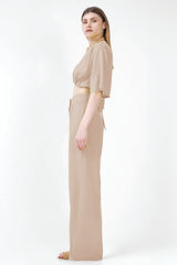 Beige matching set with cropped shirt and straight trousers