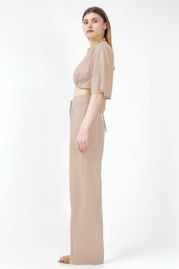 Beige matching set with cropped shirt and straight trousers