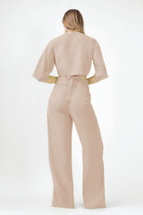 Beige matching set with cropped shirt and straight trousers