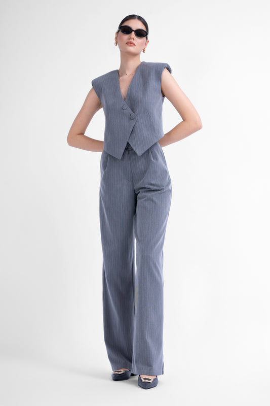 Grey pinstripe suit with asymmetrical vest and wide leg trousers