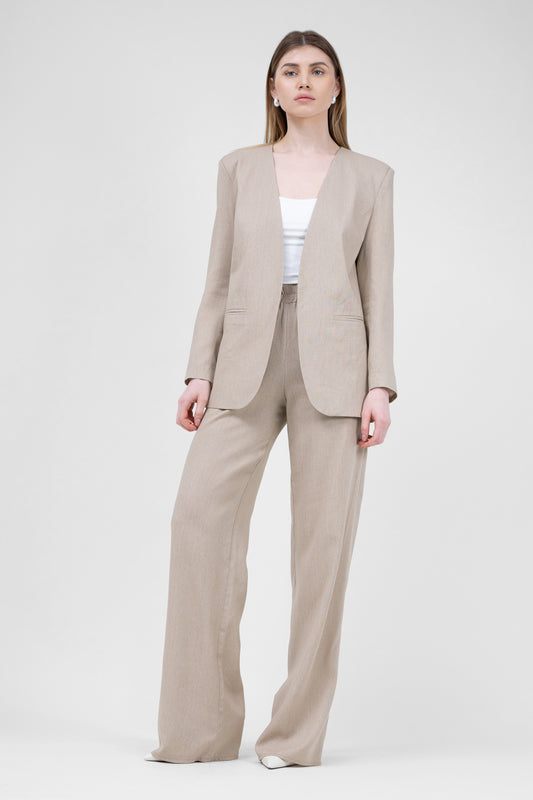 Beige linen suit with blazer and straight trousers