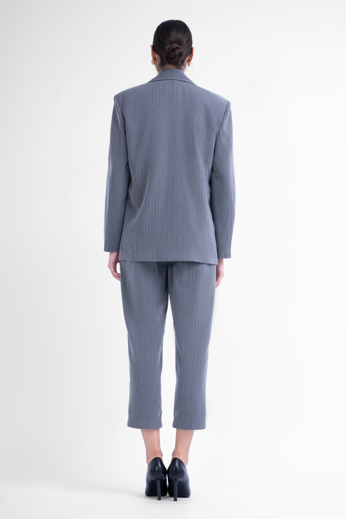 Grey pinstriped suit with regular blazer and cropped trousers
