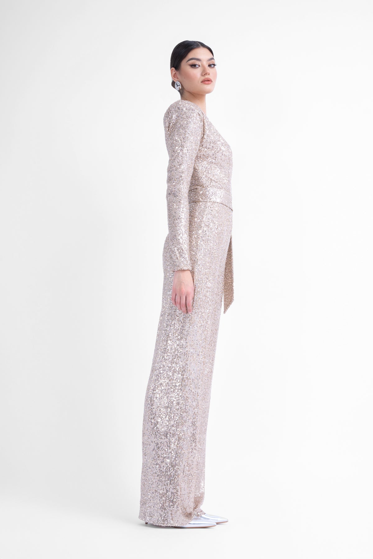 Gold maxi jumpsuit with structured shoulders and belt