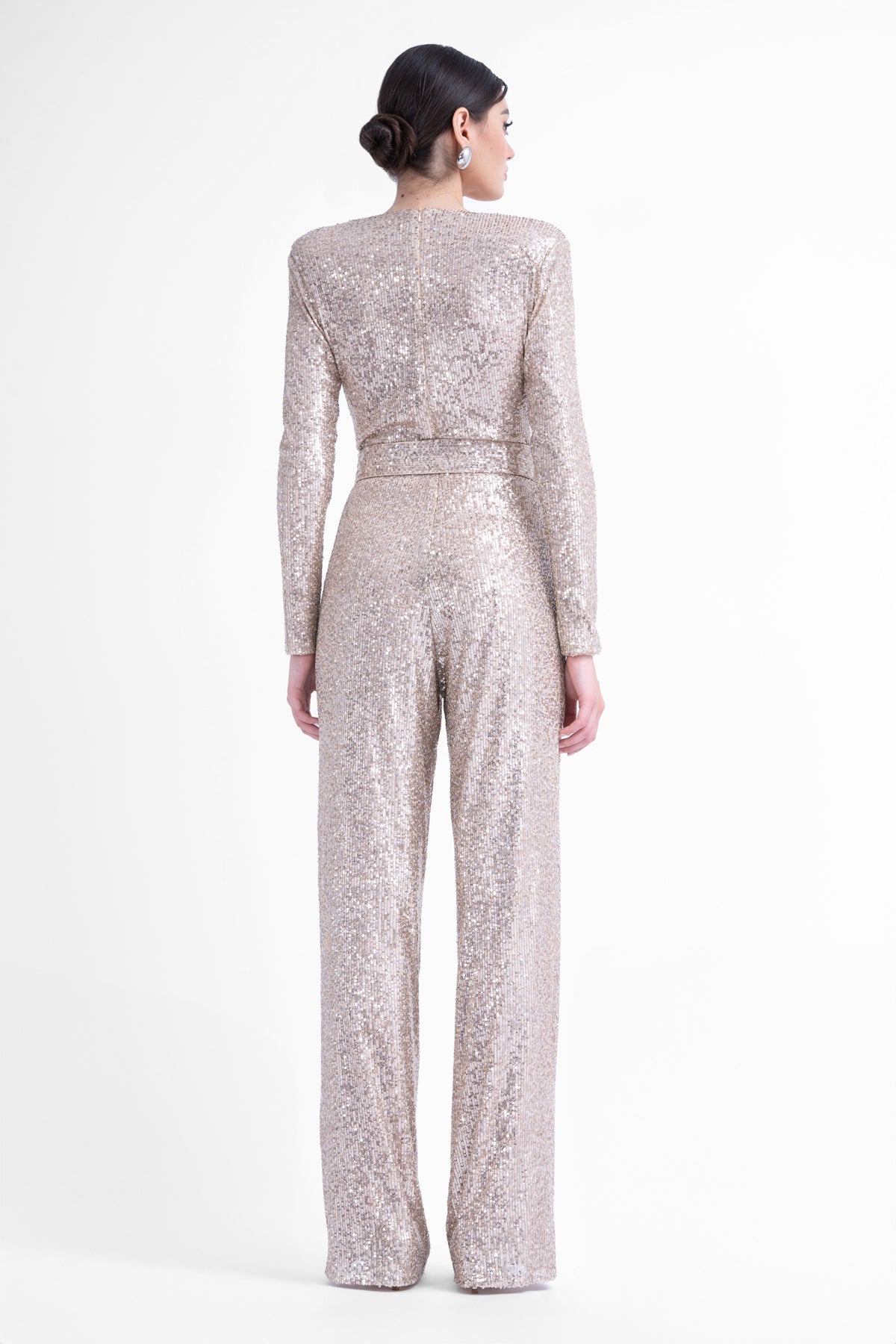 Gold maxi jumpsuit with structured shoulders and belt