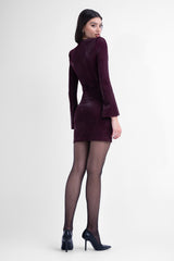 Burgundy bodycon mini dress with v-neck detail and structured shoulders