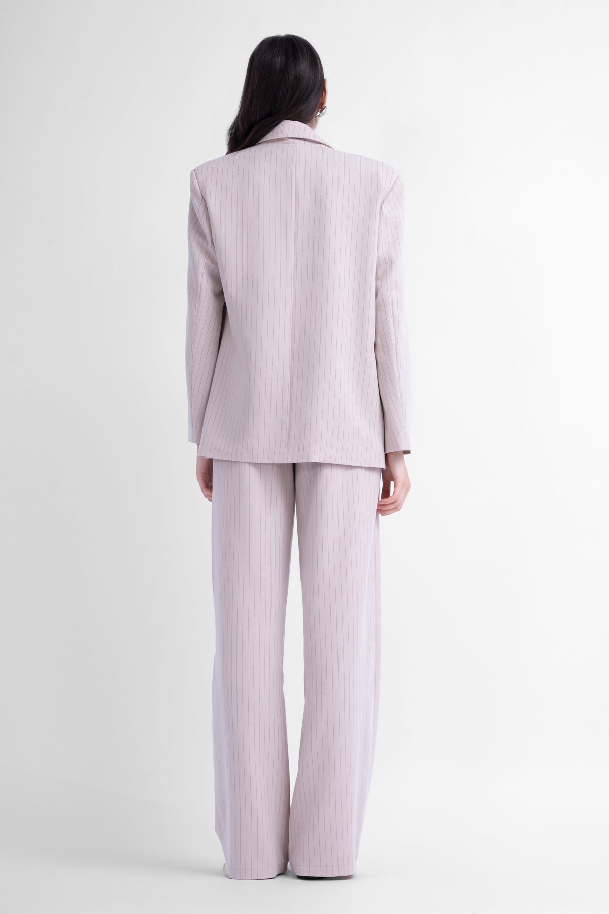 Three-piece beige striped suit