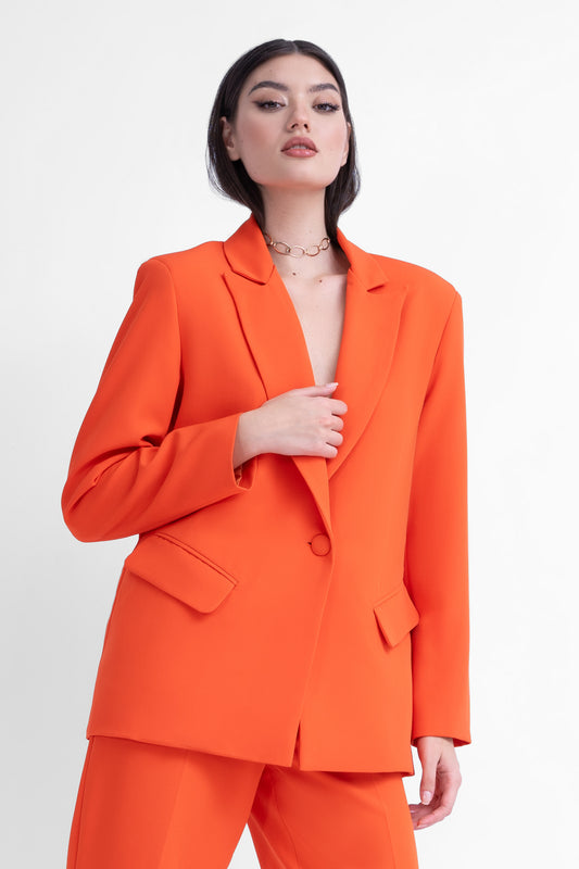 Orange suit with regular blazer and cropped trousers