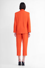 Orange suit with regular blazer and cropped trousers
