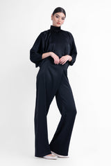 Black asymmetrical wide leg trousers with button